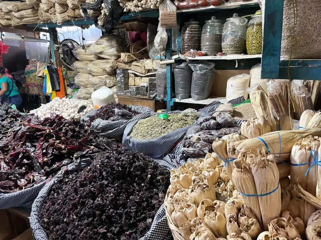 Chilis and corn husks for preparing traditional Guatemalan foods at Antigua’s central market