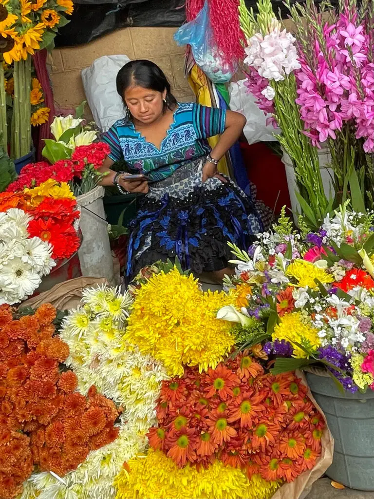 Flower seller at Antigua's central market