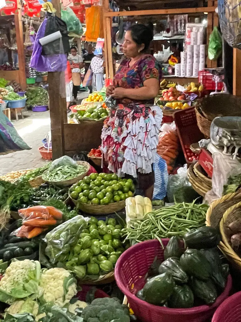 Vegetable merchant at Antigua's central market