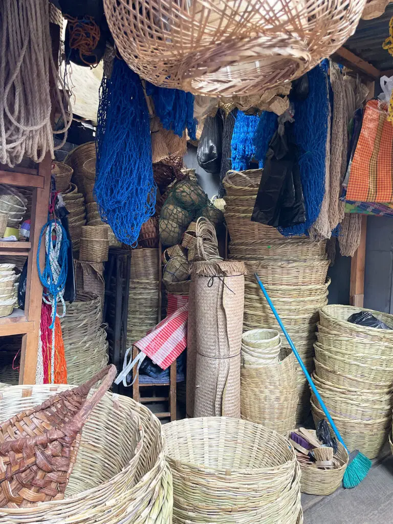Women baskets, mats and bags for sale at Antigua's central market